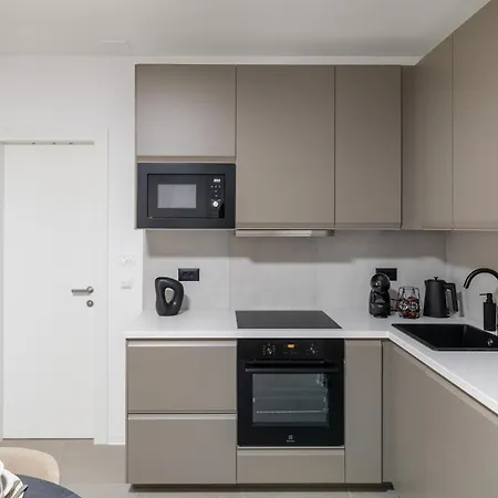 Boutique Soft Tones With Balcony And Secured Garage *